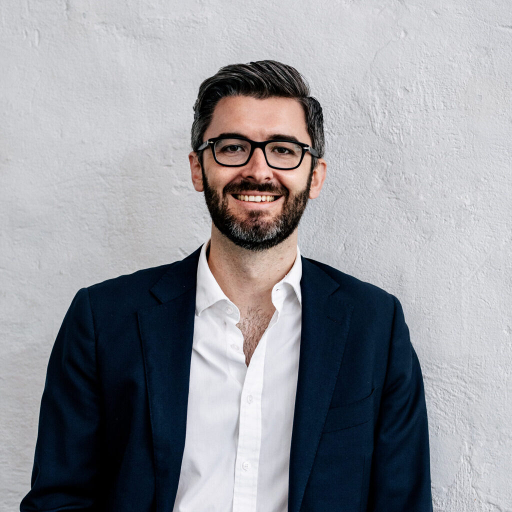 Clairs Keeley Lawyers Perth staff: Smiling lawyer in suit. Expertise in Family & Commercial Law, Estate Planning, Wills, Probate, East Perth.