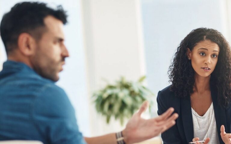 Couple in counseling session in Perth discussing order enforcements with a therapist. Clairs Keeley Lawyers offering legal agreements advice.