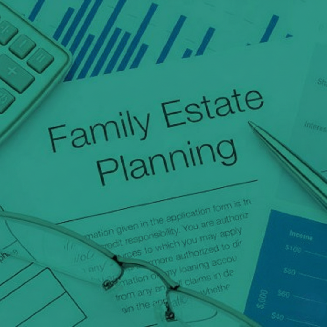 Wills and Estate Planning in Perth: Documents showing 'Family Estate Planning,' a pen, glasses, graphs, and calculator suggest financial matters.