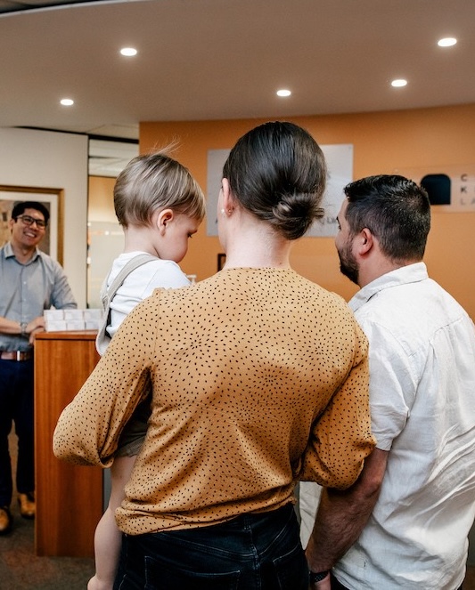 Clairs Keeley Lawyers Perth reception: Family with child, family-lawyer-office. Grant of Probate assistance & Estate Planning services.