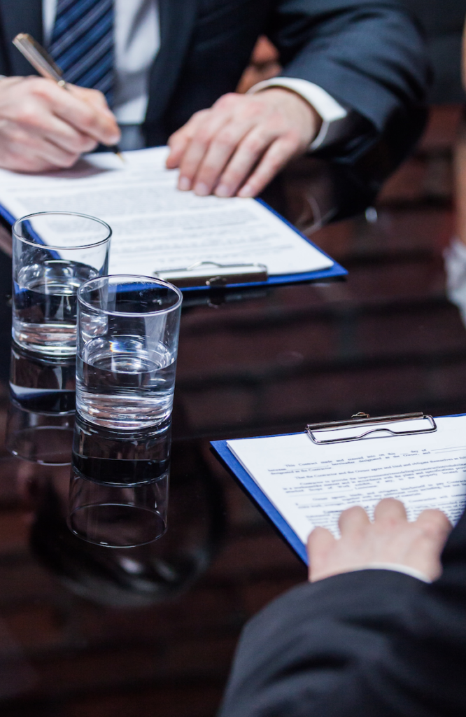 Letters of Administration Perth: Lawyers reviewing documents. Clairs Keeley Lawyers specializing in Estates, Wills, and Probate in East Perth.