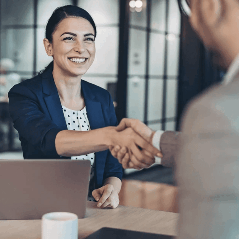 Order Agreement Enforcement in Perth: Woman lawyer shaking hands, symbolizing agreement on screen. Clairs Keeley Lawyers.